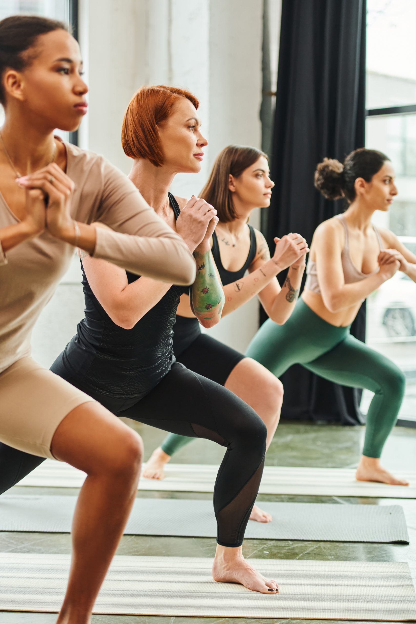 Diverse,Group,Of,Multicultural,Female,Friends,In,Sportswear,Practicing,Yoga